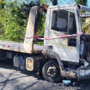 The remains of the lorry engulfed by flames