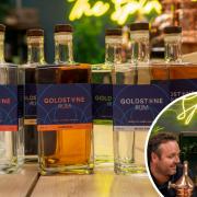 Bottles of Goldstone Rum with John and Georgina Bowell inset