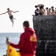 Lifeguards watched on as the teens jumped