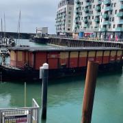 The historic barge has left Brighton Marina for the last time as it is towed to its new home in Battersea