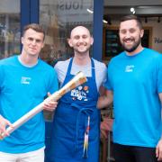 Solly March and Harry Clarke carrying the Baton of Hope