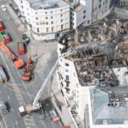 Demolition equipment and the Royal Albion hotel from above