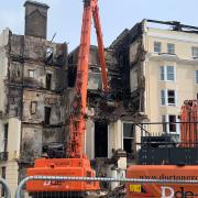 Demolition crews at the Royal Albion this morning
