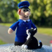 The Crochet Queen's latest creation is Postman Pat and his cat Jess