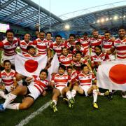 Japan celebrate their famous win over South Africa in the 2015 men's Rugby World Cup