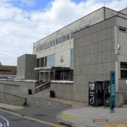 The trial of a man accused of strangling his ex-partner has started. Pictured is Brighton Magistrates' Court