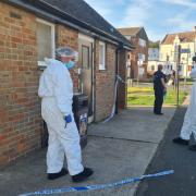 Police took photographs of the scene in Newhaven