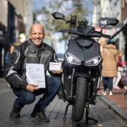 Steve Ransom with his motorbike, patent and Stop My Engine