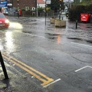 A flood alert has been issued in Patcham. Pictured is flooding at the Ladies Mile crossroads today