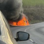 Updates as firefighters tackle car blaze