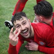 Ollie Pearce celebrates his hat-trick at Weymouth
