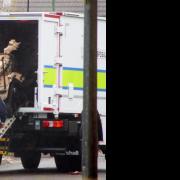 Bomb squad rolling out a robot from the back of their lorry