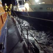 Newhaven Lifeboat alongside the fishing vessel