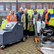 The Gladiator is being used to tackle chewing gum. From left, councillor Wendy Maples, Chris Ketley and Guy McQueen, the council’s regeneration project manager, with street cleansing staff