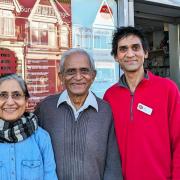 Narotam, Rama and Amit Patel outside their Post Office