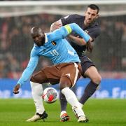 Lewis Dunk battles with Romelu Lukaku as England face Belgium