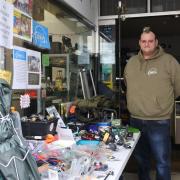 James Lock and his friends sell fishing tackle and use the profits for a foodbank. Pictured is James at his Aquarium in Eastbourne