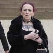 A trans woman from Brighton has been spared jail after online threats. Pictured is Layla Le Fey outside Brighton Magistrates' Court