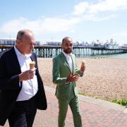 Josh Babarinde with Lib Dem lead Ed Davey enjoying an ice cream in Eastbourne