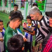 Julio Enciso signs autographs for young fans in Paraguay