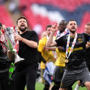 Russell Martin leads the celebrations at Wembley