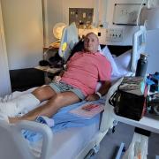 John Adamski in his hospital bed at the Royal Sussex