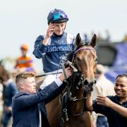 Tom Marquand celebrates success in the Brighton Bullet
