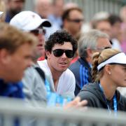 Rory McIlroy watches the action today