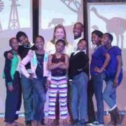 Mary Silver, with some students in South Africa