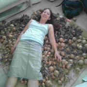 Zoe Morrison with onions she picked to freeze over the winter