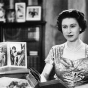 Queen Elizabeth II, in the Long Library at Sandringham, after making the first televised Christmas day broadcast to the nation in 1957