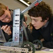 Kyle Kneller (left) and Max Gilbert constructing robots Picture: Terry Applin