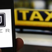 A taxi driver has criticised Uber for taking over the city