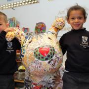 Lancing Prep School pupils pose proudly with their decorated snowpuppy.