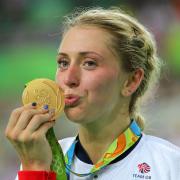 Great Britain's Laura Trott kisses her gold medal
