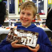 Edward playing at the Sussex Junior Chess Christmas party