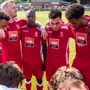 Whitehawk in the huddle before their battling 2-2 draw with Poole. Picture by JJ Waller
