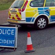 Part of A259 closed after car and motorcycle crash near roundabout