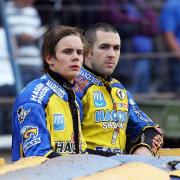 Scott Nicholls, right of picture, watches a meeting with Simon Gustafsson during his season with Eastbourne Eagles. Picture by Mike Hinves