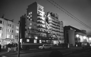 The fire brigade shines a light on the bomb blast in The Grand Hotel Brighton which was attacked by the IRA during the Conservative Party Conference: credit - Simon Dack