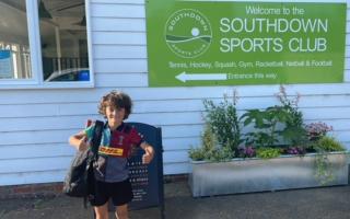 Archie Robertson, 8, raised hundreds of pounds for an animal rescue centre by playing squash