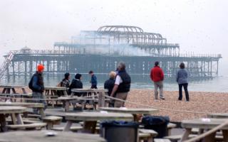 Residents and visitors looked on helplessly as the pier burned