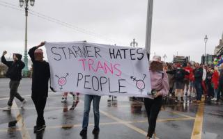 Trans activists protested in front of the Labour group in Brighton Pride's parade