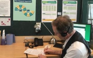 A listening volunteer providing support to a caller