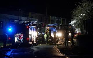 A woman has died after a flat fire in Bexhill