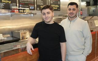 Sahin Saglam, left, and Hamit Ermis have set up a initiative to give free fish and chips to those in need