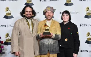 Luke Brooks, left, James Theseus Buck and Annie Collinge with their Grammy award