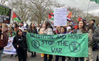 Members of Stop the War Brighton and Hove protesting in Brighton.