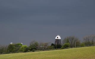 Dark skies over the Jack windmill in Clayton, near Hassocks