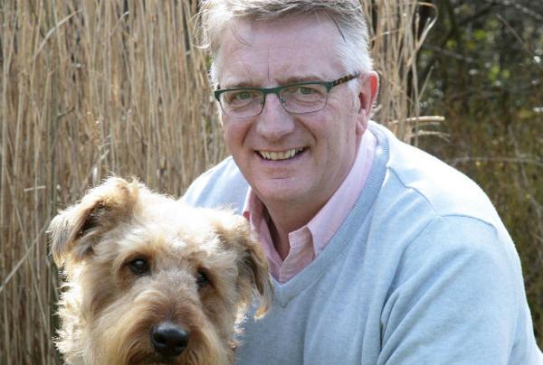 RSPCA chief executive Jeremy Cooper with his dog Daisy. Picture: RSPCA/PA Wire